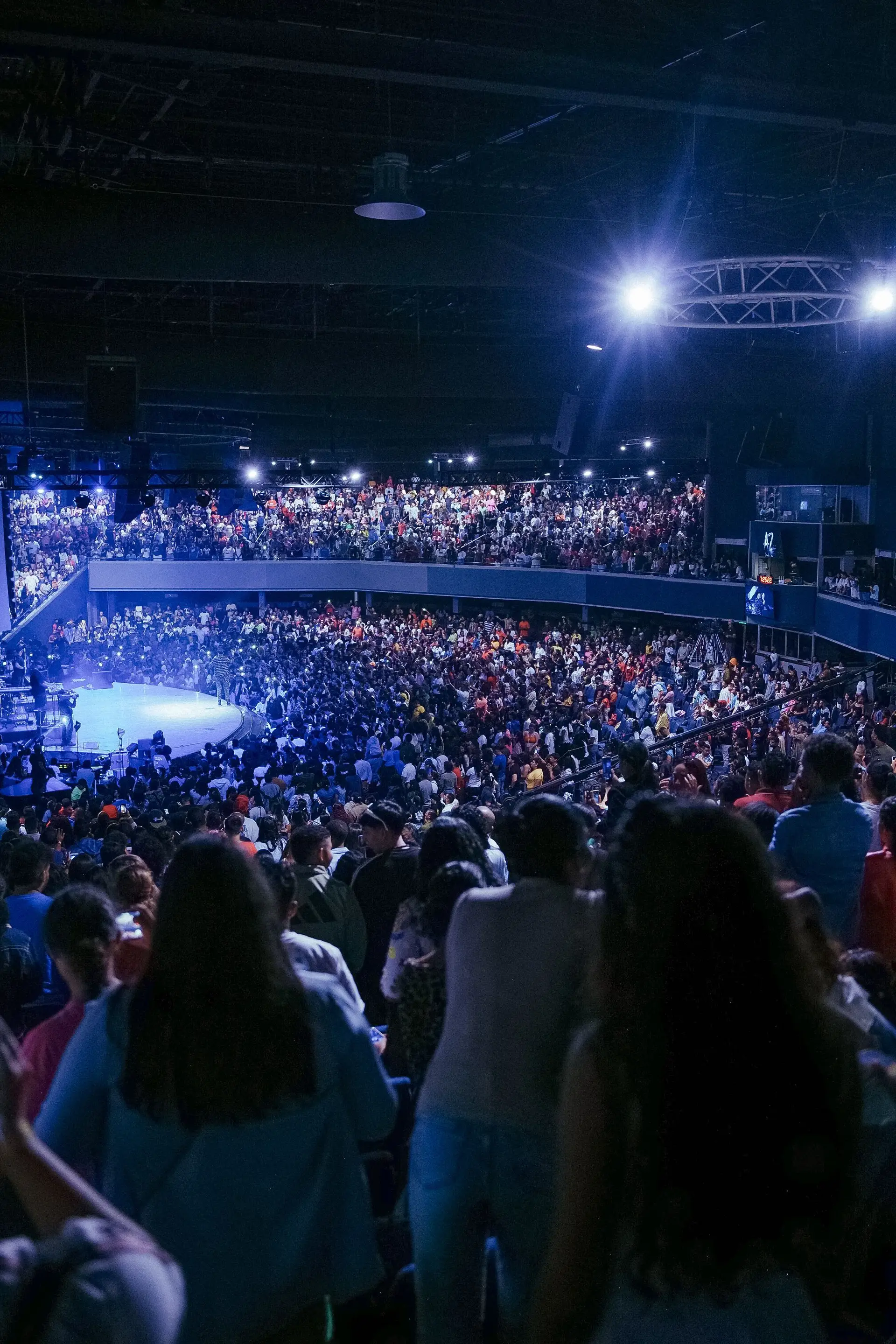 Packed indoor concert crowd